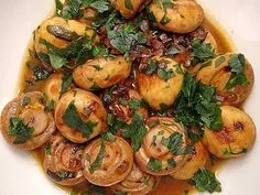 Knoblauchpilze in Parmesankäse