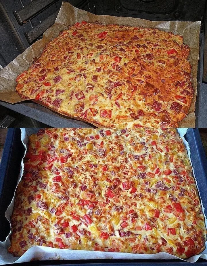 Leckere Schüttelpizza auf einem Teller, garniert mit frischen Zutaten.