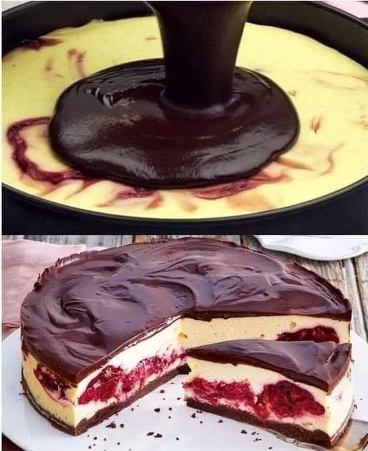 Schwarzwälder-Käse-Torte mit Schokolade und Kirschen auf einer weißen Platte