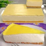 Zitronen Joghurt Torte mit frischen Zitronenscheiben und Joghurt-Topping